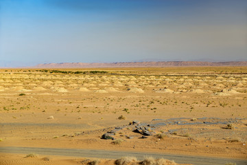 digging for water in desert of morocco