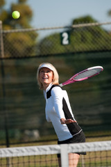 Blond Woman Playing Tennis
