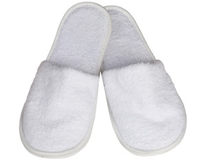 white terry slippers isolated on white background