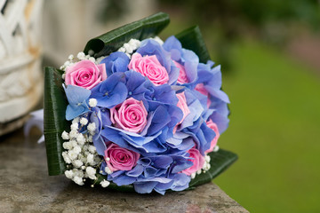 Wedding bouquet with hydrangea and pink roses
