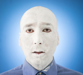 Artistic painting man face in white