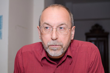 Closeup of man in glasses