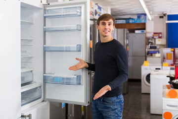 Man choosing new fridge