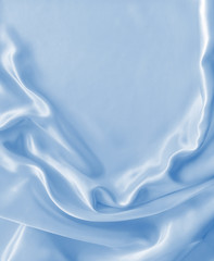 Obraz premium Smooth elegant blue silk or satin as background