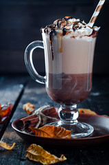 Autumn background with hot coffee cup