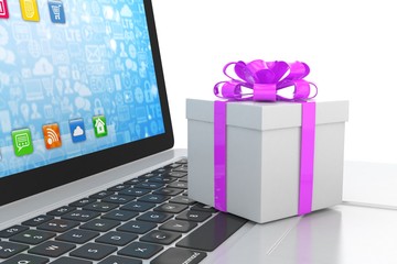 Gift box with ribbon on laptop keyboard. 3d rendering.