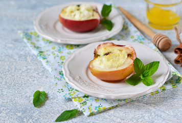 Apples baked with cheese, raisins, honey and cinnamon 