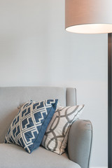 modern white lamp with set of sofa in modern living room design