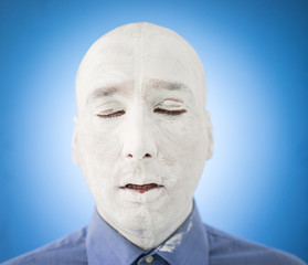 Artistic painting man face in white