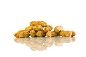 Peanuts in shell on white