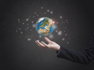 business hand holding globe earth concept business social. Elements of this image furnished by NASA