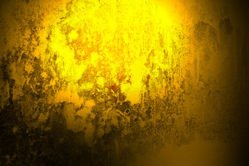 Grunge brushed gold metal texture ; abstract industrial or Halloween background 