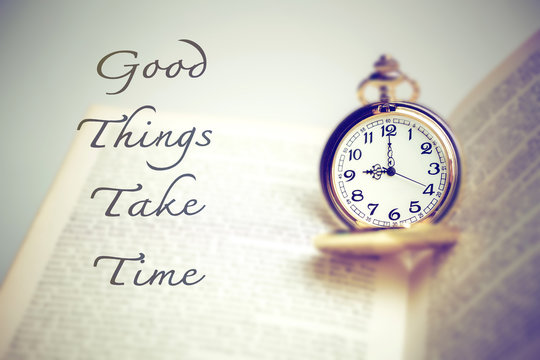 Vintage Pocket Watch over Age Book Background with Inspiration Quote " Good Thing Take Time " Text For Time Concept, Instagram Image Tone.