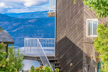 Fragment of a very neat and colorful home with gorgeous outdoor landscape in suburbs of Vancouver, Canada