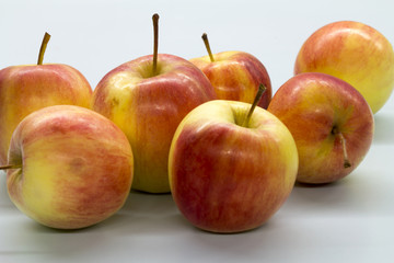 red apple  on white table
