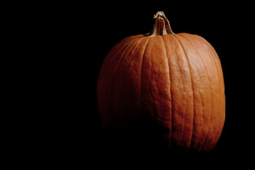 pumpkin on black background Halloween concept