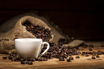 Coffee beans on wooden background