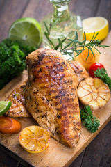 Grilled chicken breast on the cutting board