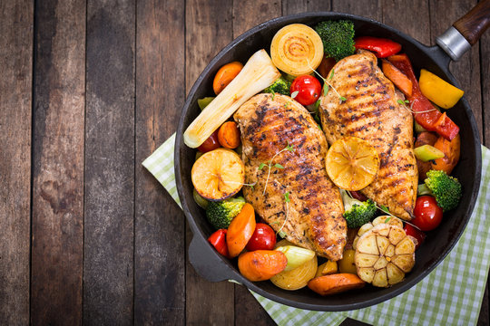 Grilled Chicken Breast And Vegetables In The Pan