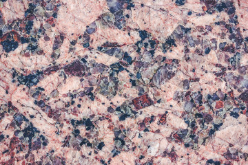 Red mineral closeup background.