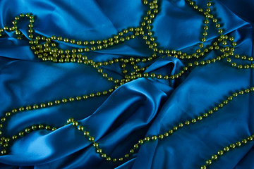 blue satin fabric, silk fabric, the fabric folds, draping
