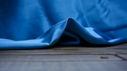 blue satin fabric, silk fabric, the fabric folds, draping