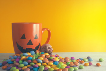 cup and skull with candy