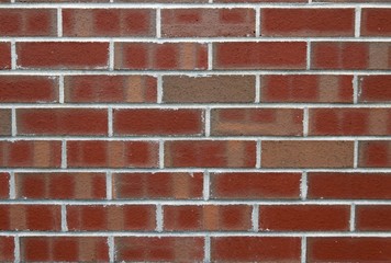 Obraz premium closeup of a red brick wall for backgrounds