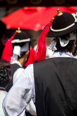 Wedding ceremony staffs wearing clothes and hats of Korean tradi