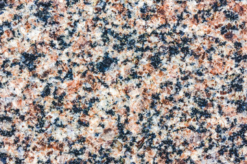 Red granite mineral flat surface texture.