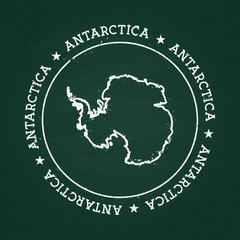 White chalk texture rubber seal with Antarctica map on a green blackboard. Grunge rubber seal with country outlines, vector illustration.