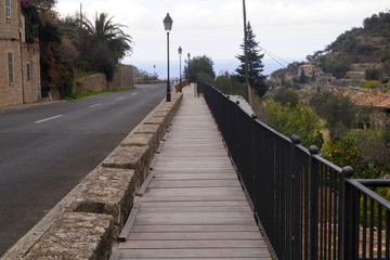Fototapeta premium Mediterranean landscape on a cloudy day. Boardwalk.