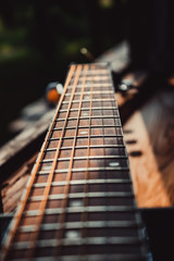 the neck of the old guitar dark color