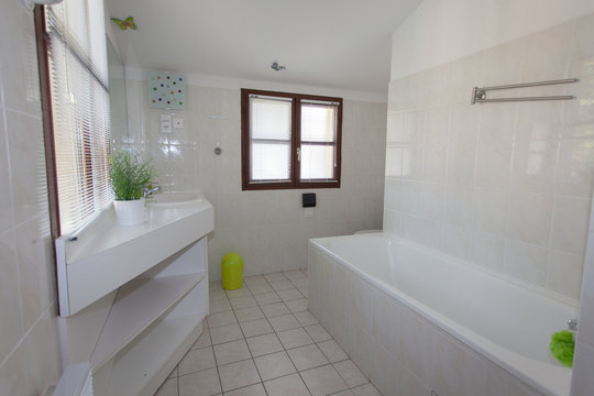 Modern white Bathroom interior in a bright house