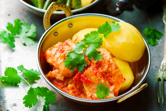 Poached Fish in Tomato Sauce