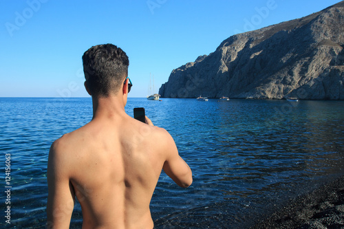 Fotografare Sulla Spiaggia Di Kamari Stock Photo And