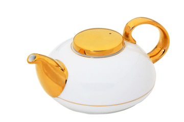 White teapot with gold and ceramic handle isolated on white with