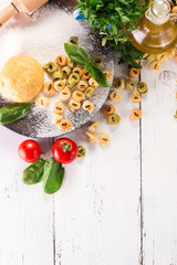 Making fresh rainbow italian tortellini with organic produce.