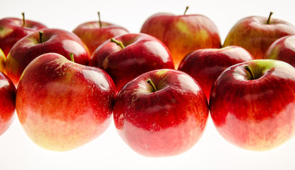 Red ripe apples on a white background