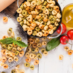 Making fresh rainbow italian tortellini with organic produce.