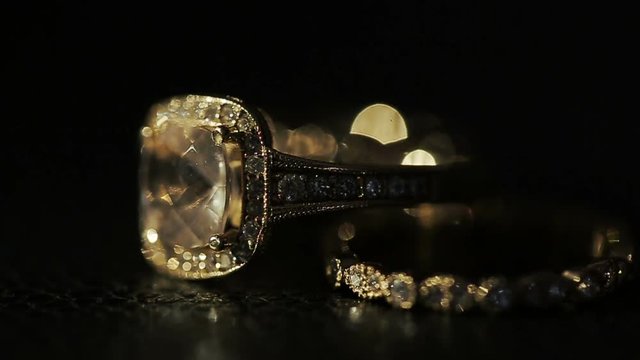 Rich wedding ring sparkles in the rays of morning sun