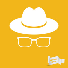 white hat with glasses on the yellow background