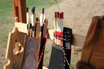 Colored feathers for arrows in a quiver