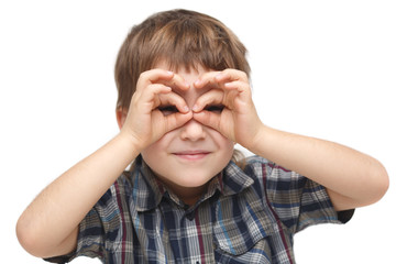 Cute boy holding the hand of a person in the form of binoculars isolated on white background.