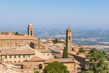 Fototapeta na wymiar Montalcino, Italy. The old part of the city and the bell towers