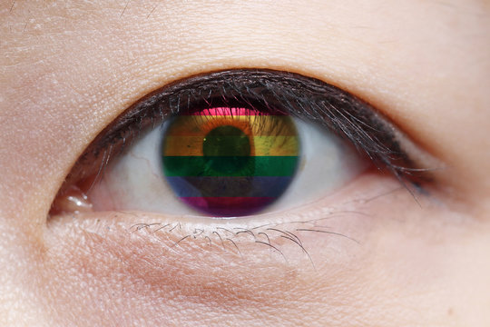 image of rainbow flag or LGBT flag inside woman eye