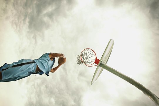 Man Playing Basketball