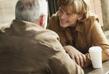 Couple Talking Over Coffee