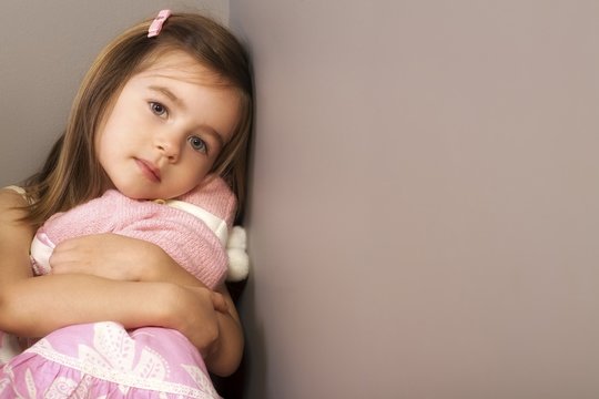 Girl Hugging Her Toy