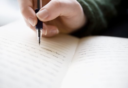 Writing In Her Journal Stock Photo | Adobe Stock